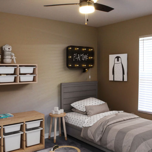 A childs bedroom with a small bed and shelves.